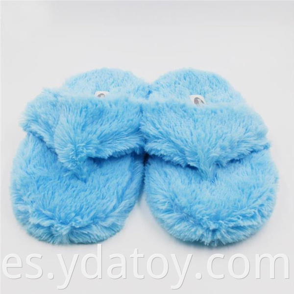 Blue monster plush slippers